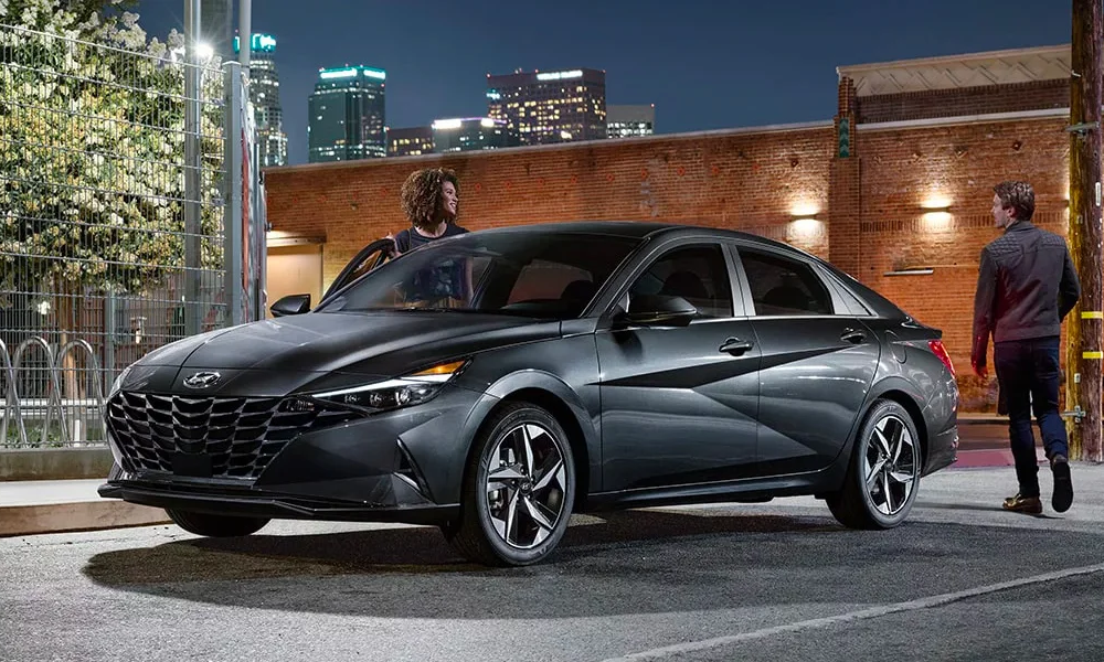 The 2023 Hyundai Elantra against a city sidewalk backdrop